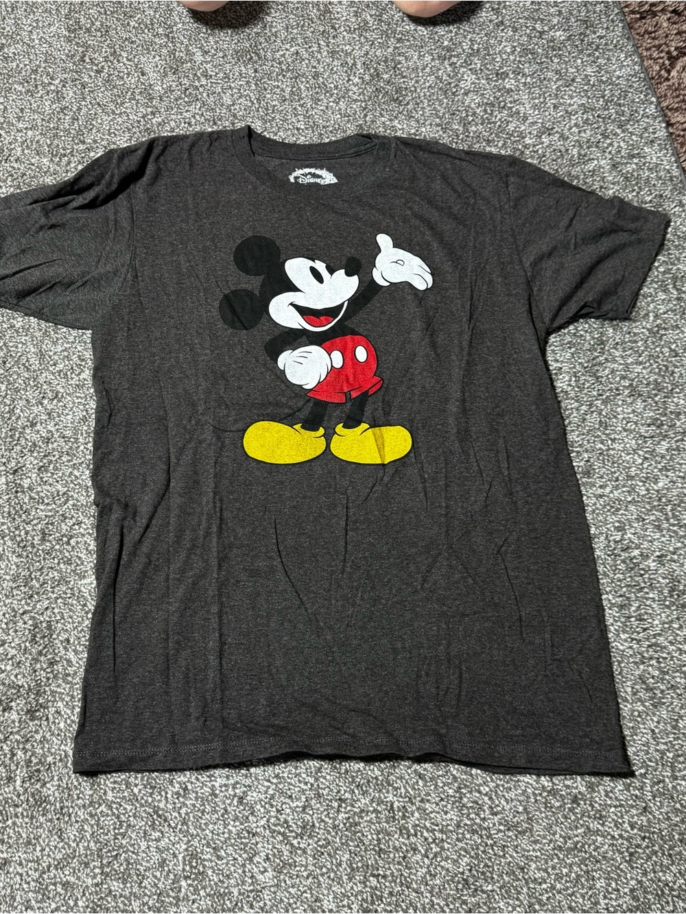 Disney Men’s Black Mickey Mouse Graphic Tee with Red and Yellow Accents